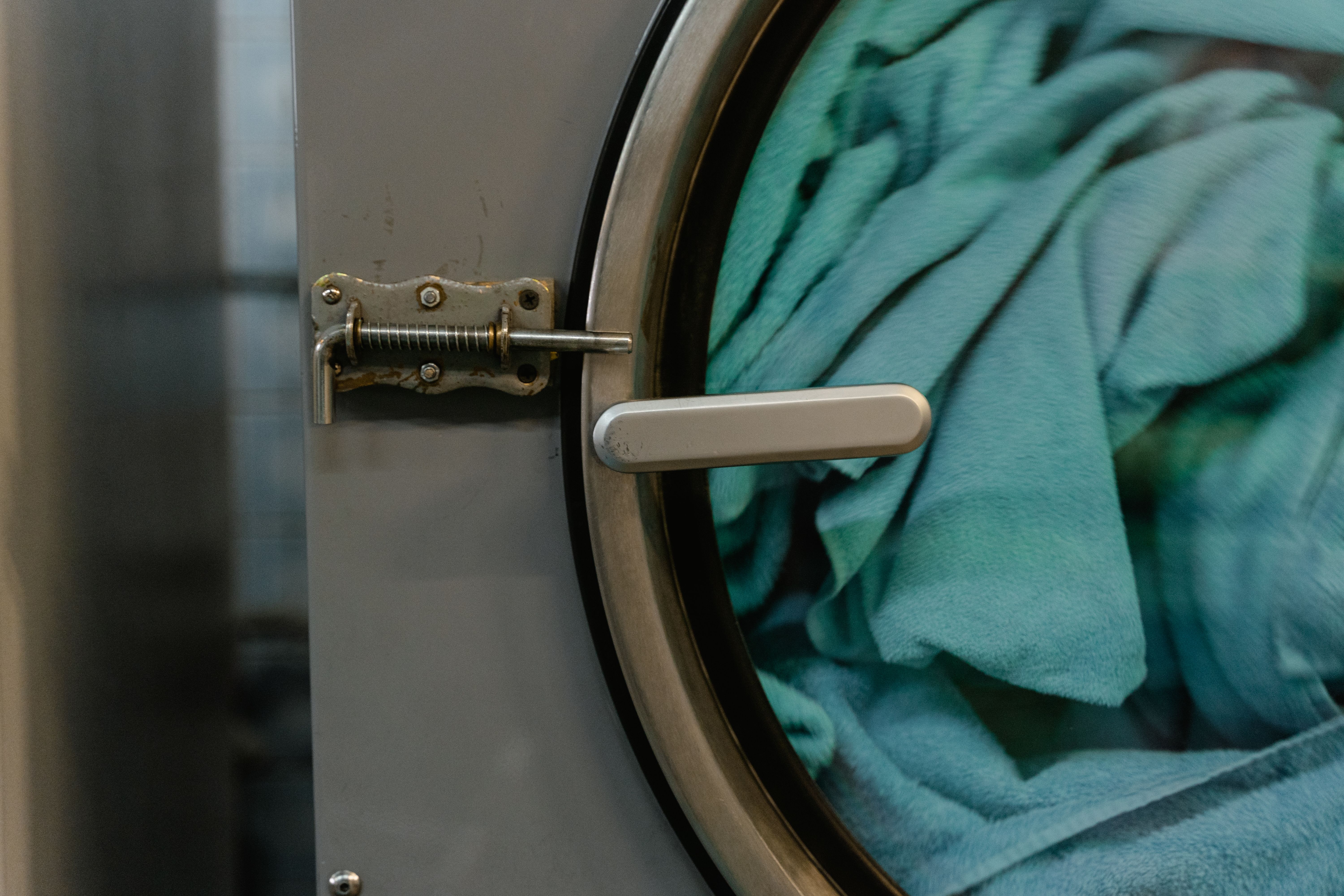 A close-up of fabric inside a washing machine during a wash cycle
