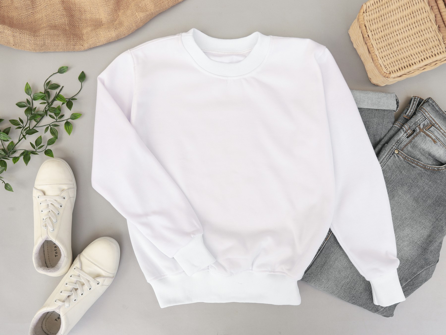 Plain white cotton t-shirt, the garment most likely to hold sweat odour at the underarms.